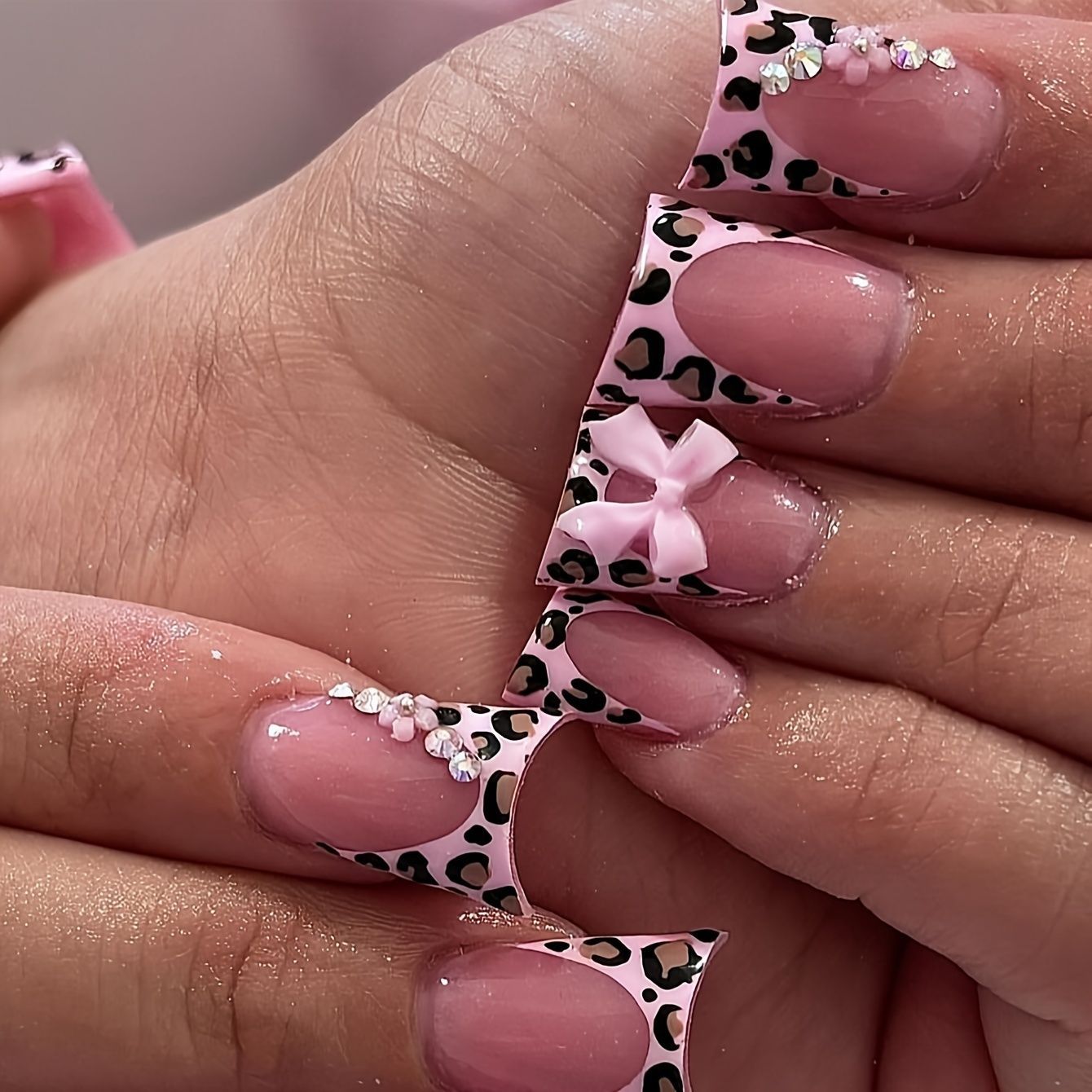 Fierce Fashion Leopard Print Medium Duck Pink Press On Nail Set with Bow and Gem Accents