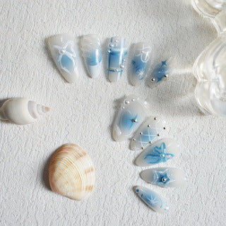 Ocean Dreams Irregular Medium Almond Cloudy Blue Nail Set with Sparkling Accents