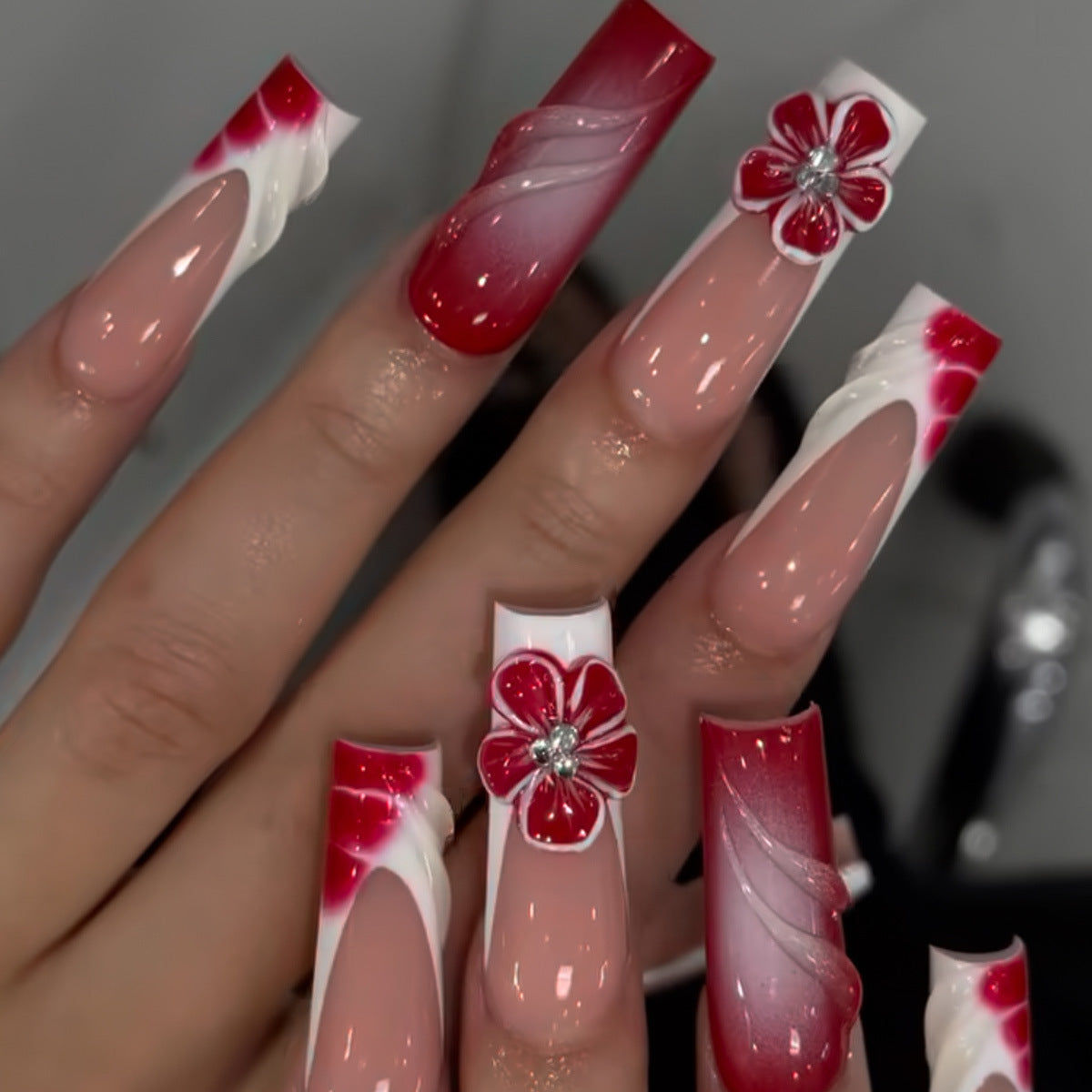 Charming Floral Fantasy Long Square Red Ombre Nails with Elegant Flower Accents