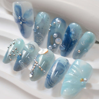 Ocean Breeze Dreamy Long Almond Blue Press-On Nail Set with Iridescent Pearls and Artistic Design