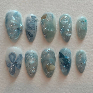 Oceanic Serenity Long Almond Shaped Aqua Press On Nail Set with Glittering Oceanic Embellishments