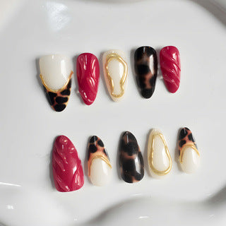 Wild Elegance Long Almond Shaped Burgundy and Ivory Leopard Print Press On Nail Set with Gold Accents