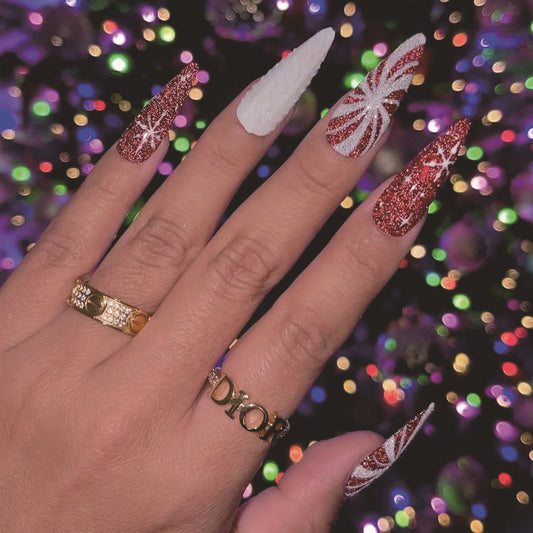 Festive Glamour Long Almond Red and White Glitter Press On Nail Set with Intricate Holiday Swirl Design