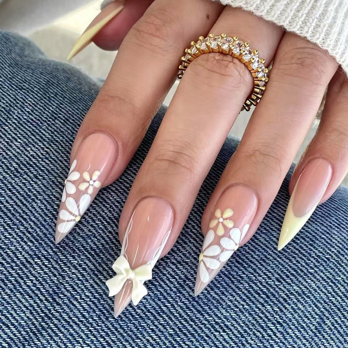 Enchanting Floral Romance Long Stiletto Beige with White Floral Design and Bow Accents Press On Nail Set