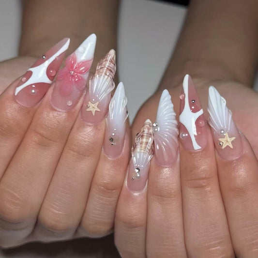 Ocean Breeze Long Stiletto Gradient Pink and White Nail Set with Shell and Floral Accents