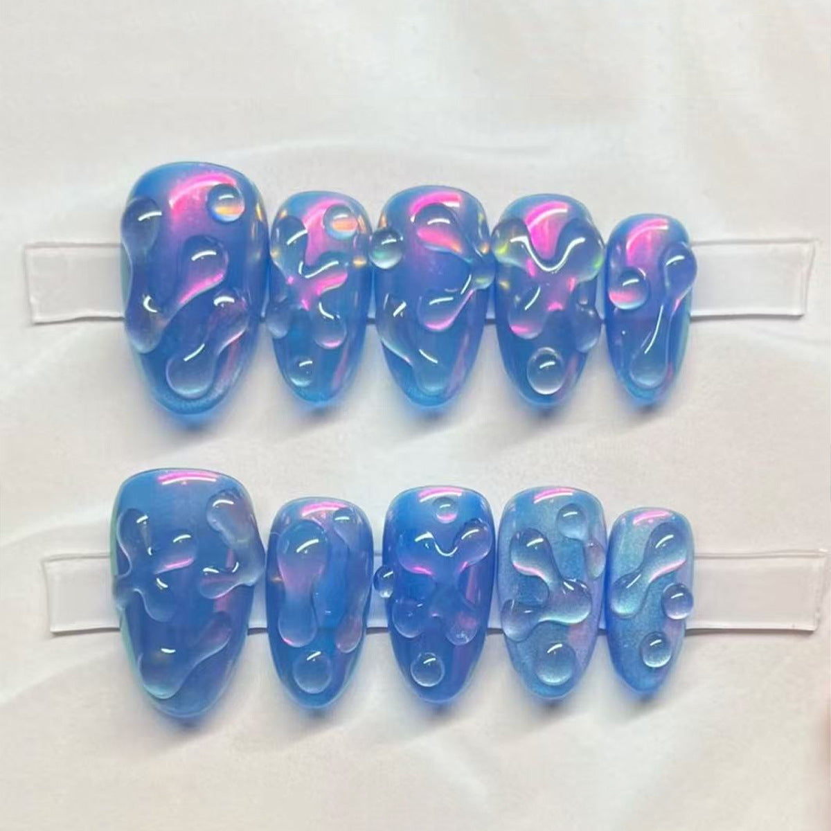 Oceanic Dreams Blue Short Almond Press-On Nail Set with Iridescent Wave Design