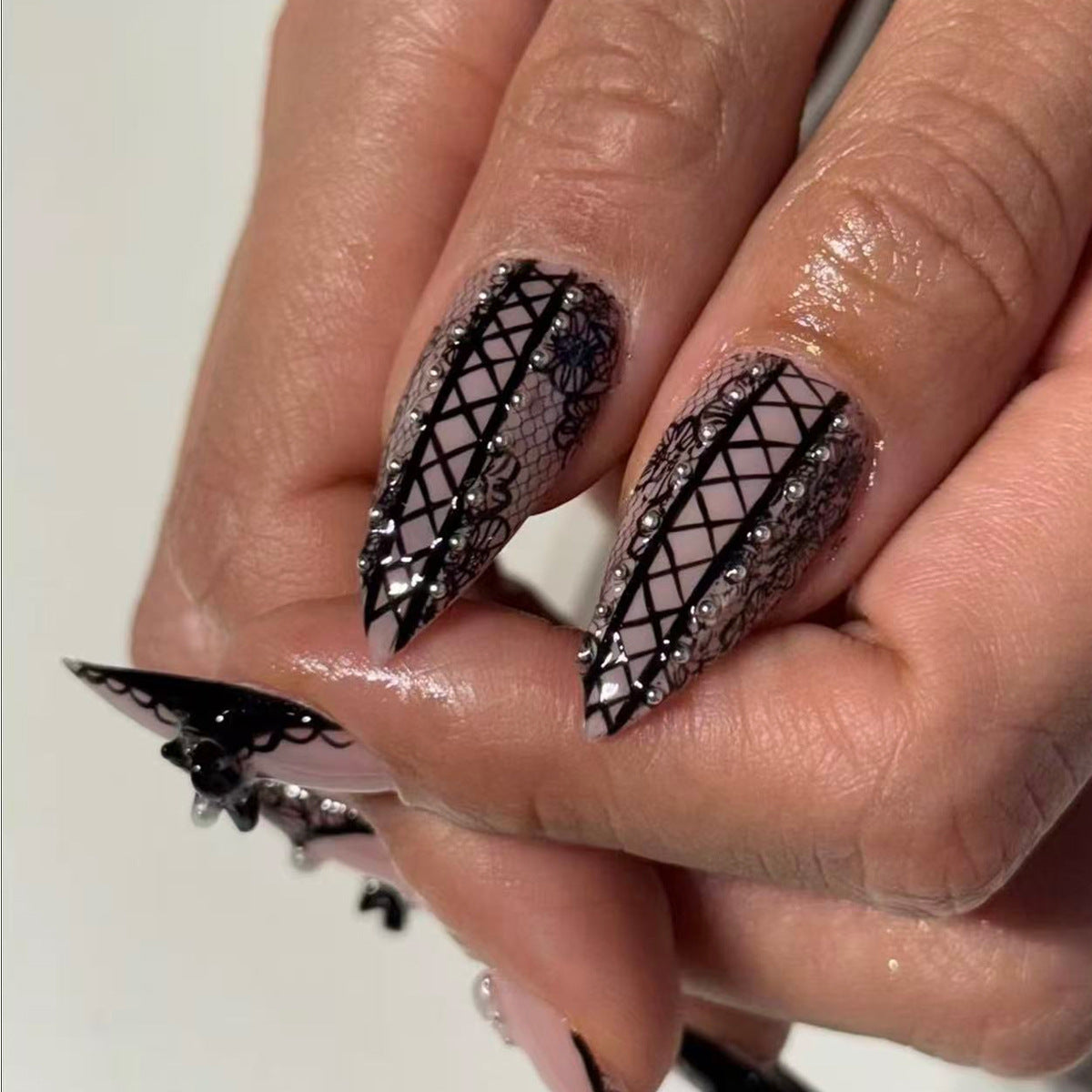 Elegant Noir Long Stiletto Press On Nail Set in Pink and Black with Intricate Lace Detailing and Crystal Accents