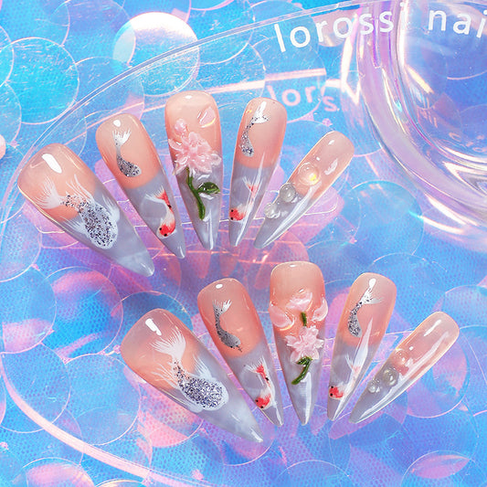 Whimsical Aquatic Dream Medium Stiletto Gradient Pink Nails with Floral and Fish Design