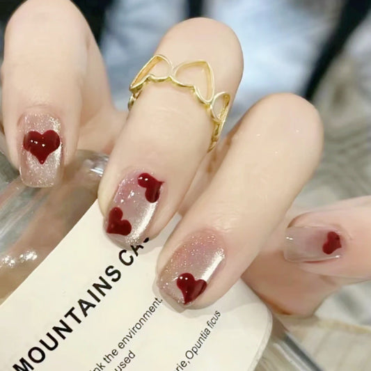 Enchanted Amour Medium Length Square Shape Clear Press On Nails with Red Hearts and Glitter Accent