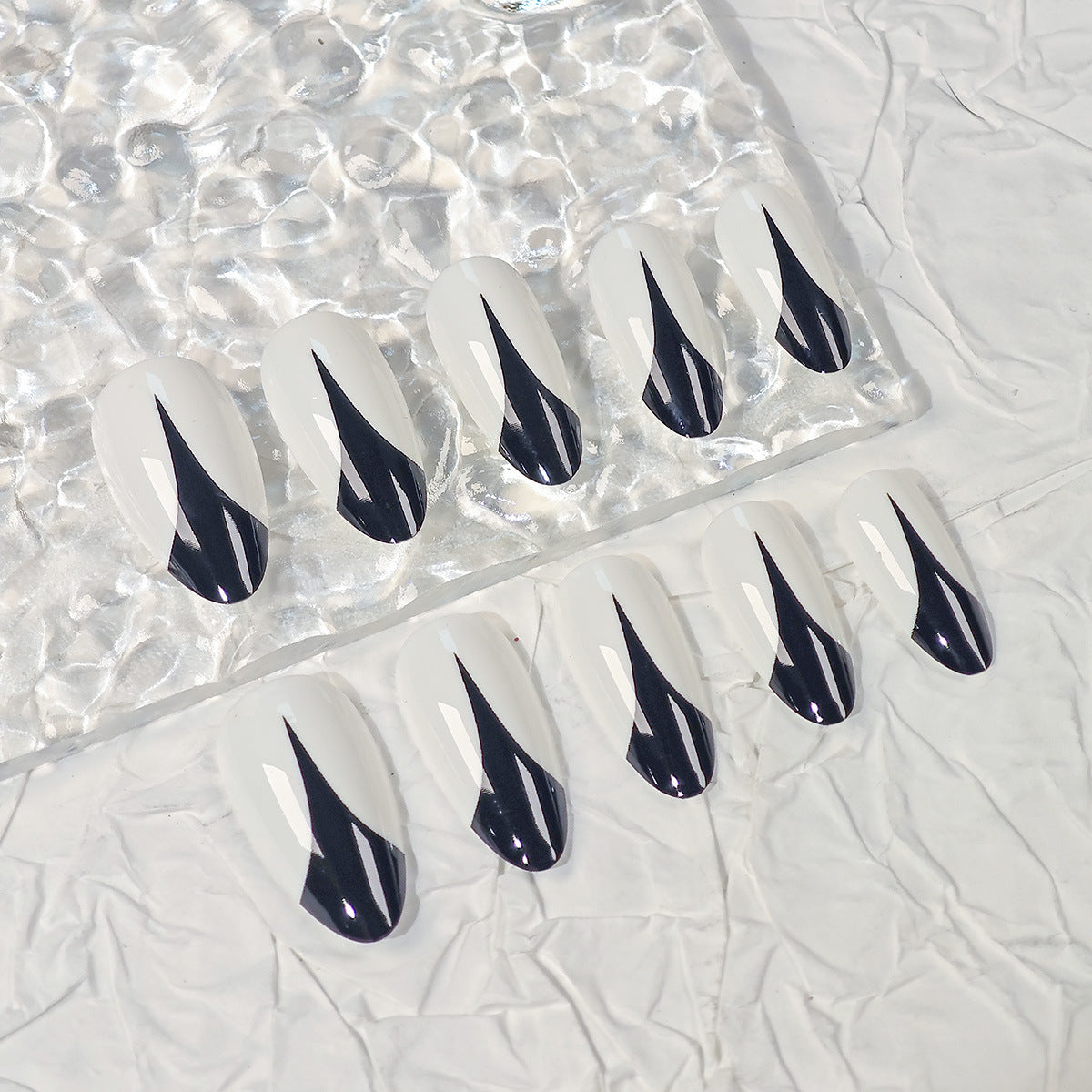 Midnight Elegance Long Almond Press On Nail Set White and Black with Unique Geometric Design