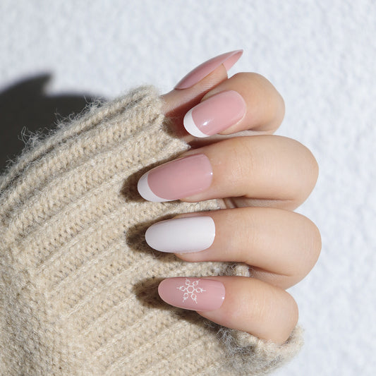 Cozy Winter Wonderland Medium Oval Pink and White Ombre Nails with Elegant Snowflake Design
