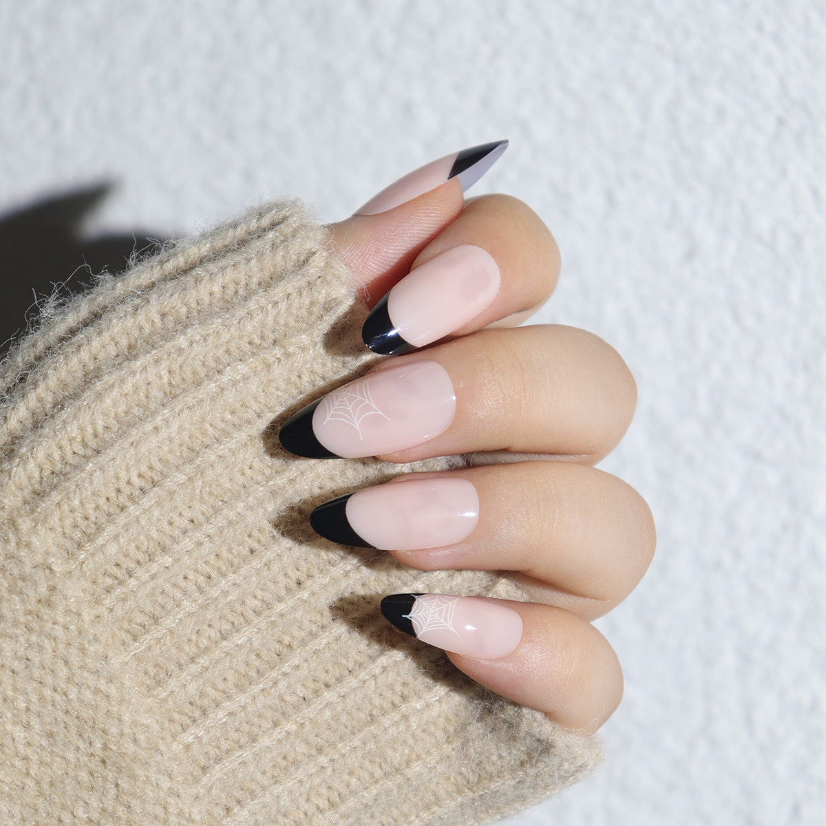 Enchanted Elegance Long Almond Pink with Black Tips Featuring Intricate Spider Web Design Press On Nail Set
