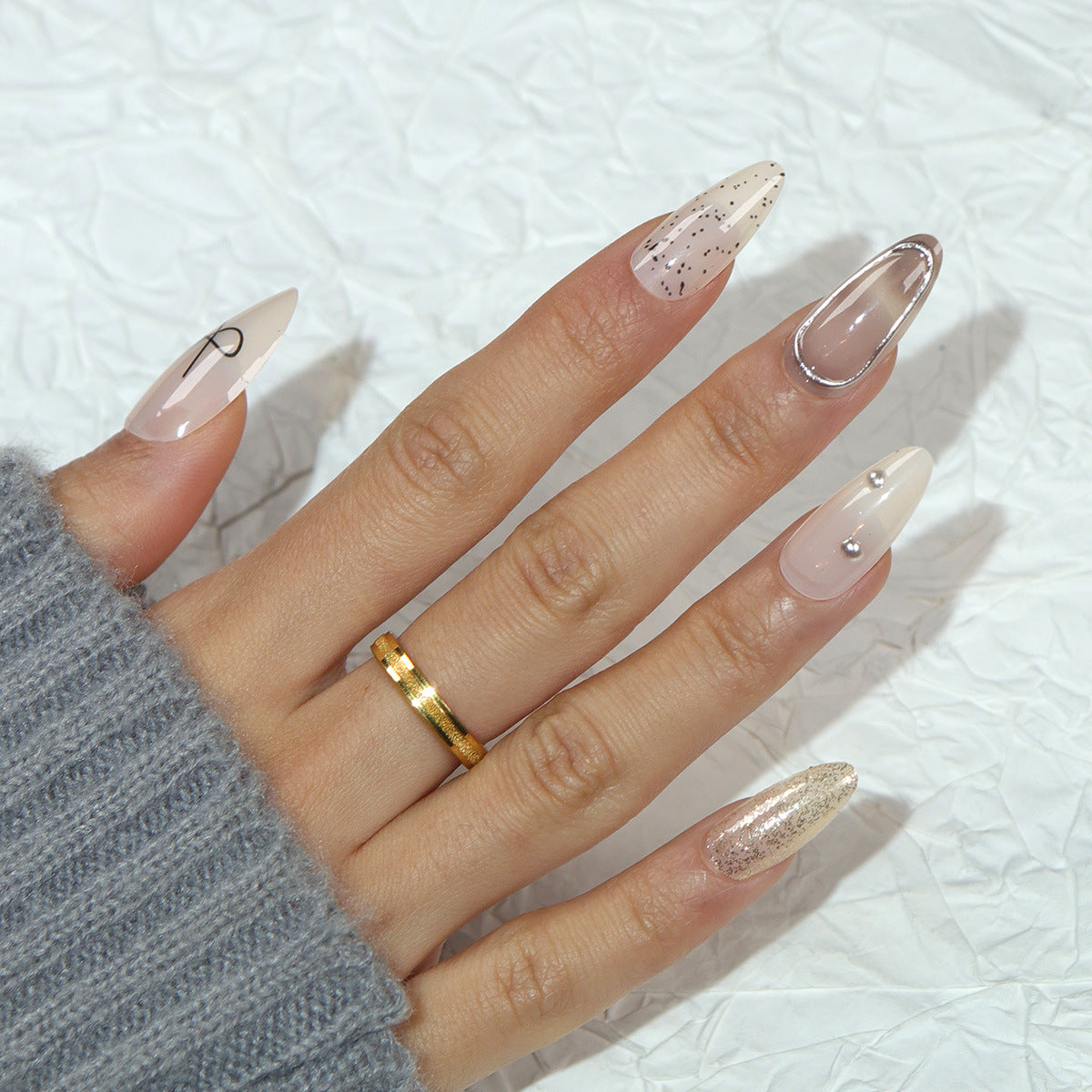 Elegance Unleashed Long Almond Shaped Soft Beige With Stunning Glitter Accents Press On Nail Set