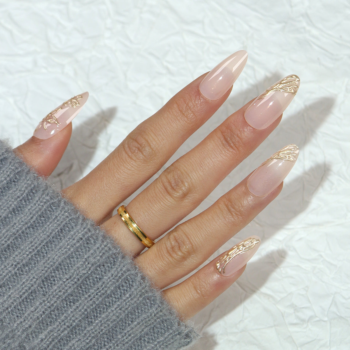 Elegance Awaits Medium Almond Shaped Blush Pink Nails with Luminous Gold Accent Design