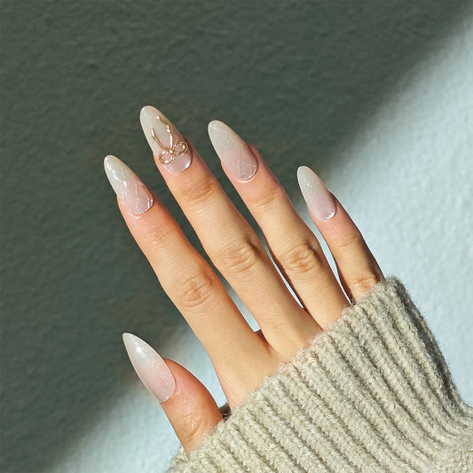 Whimsical Elegance Long Almond Shaped Translucent White with Delicate Bow Accent Press on Nail Set