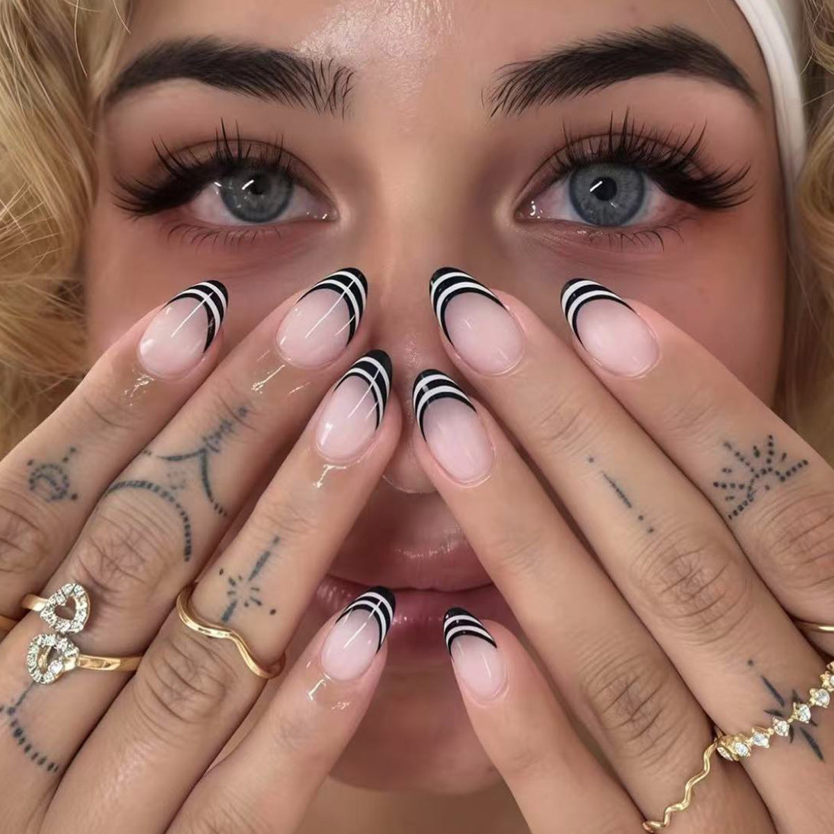 Bohemian Elegance Medium Almond Shape Soft Pink with Bold Black Stripes Nail Set