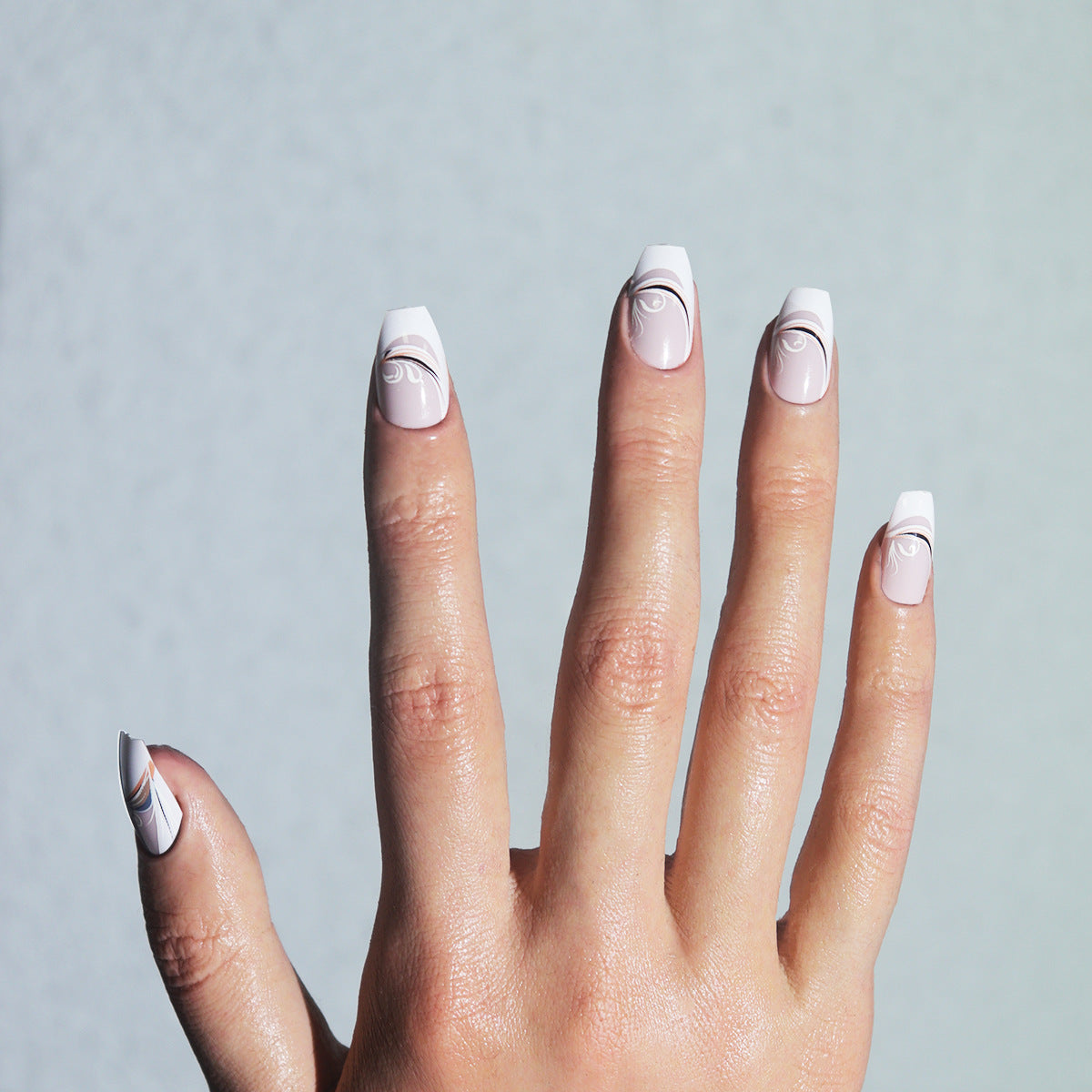 Elegant Serenity Short Coffin White and Soft Pink Nail Set with Artistic Swirl Design