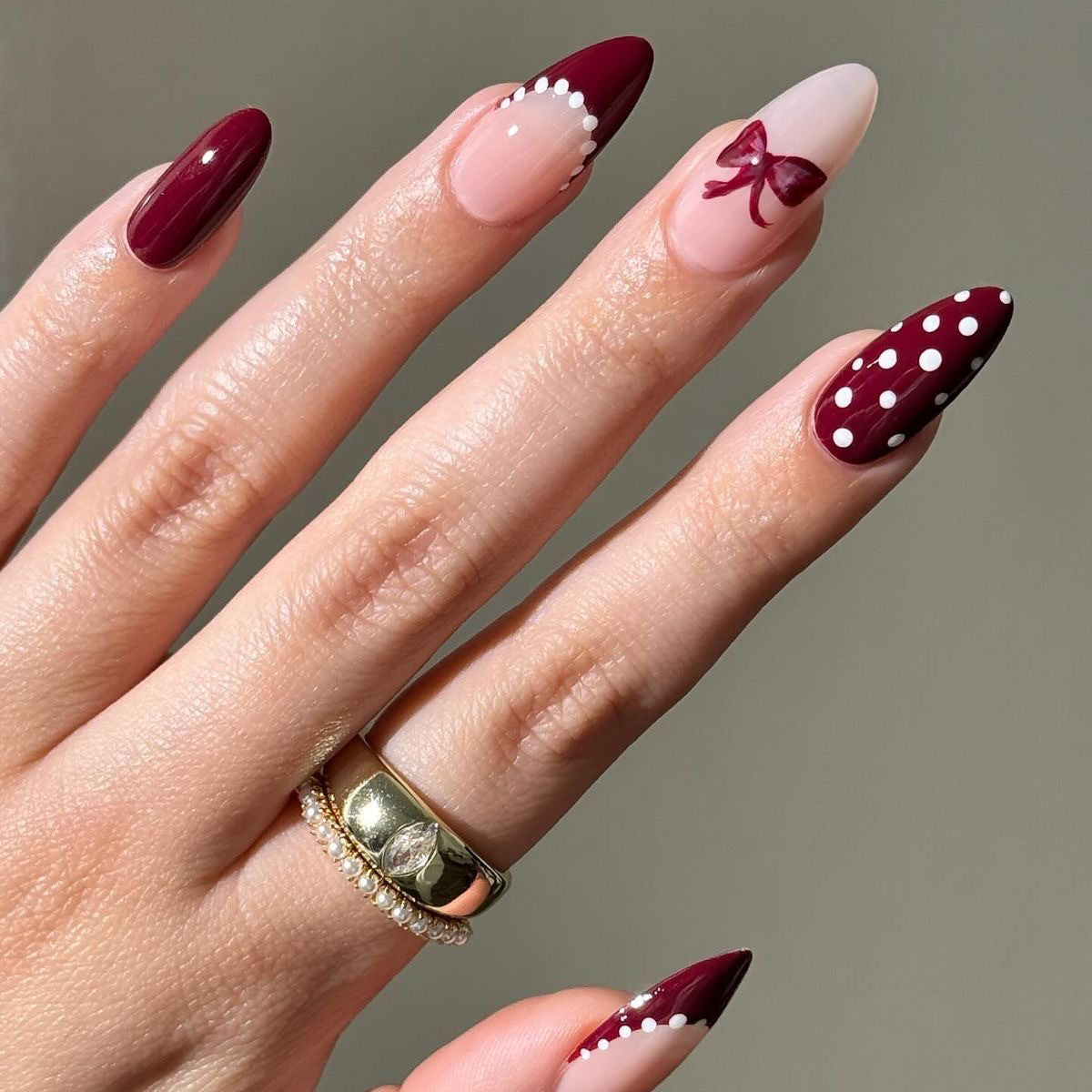 Whimsical Elegance Long Almond Burgundy and Blush Nail Set with Charming Bow and Dotted Design