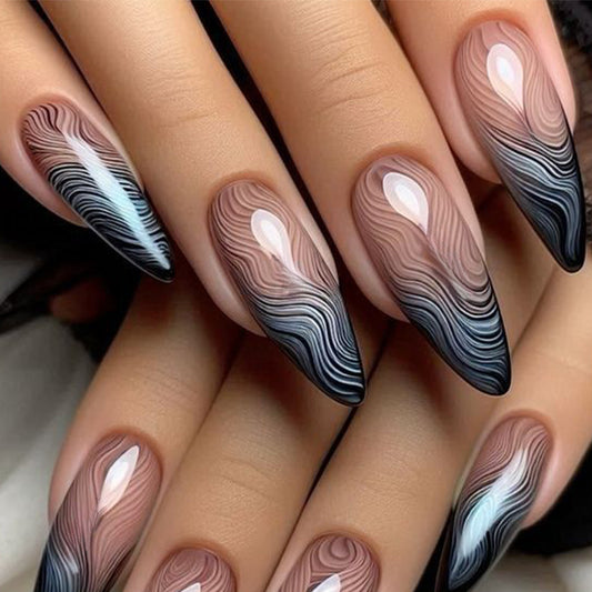 Glamorous Ocean Waves Long Stiletto Ombre Nails with Unique Swirl Design