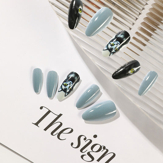 Mystical Feline Fantasy Medium Almond Shaped Sky Blue and Black Press On Nail Set with Unique Cat Eye Design