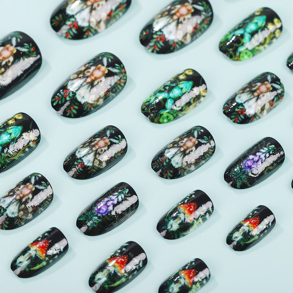 Enchanting Garden Inspired Short Oval Black Floral Press On Nail Set with Artistic Botanical Design