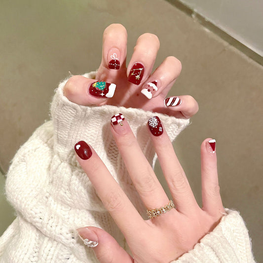 Festive Candy Cane Inspired Long Square Shape Burgundy Press On Nail Set with Christmas Themed Designs and Glitter Accents