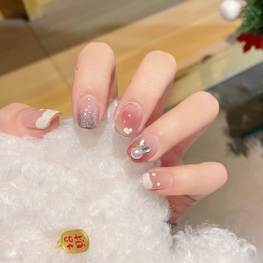 Whimsical Winter Wonderland Long Oval Beige Glitter Press On Nail Set with Heart and Pearl Accents
