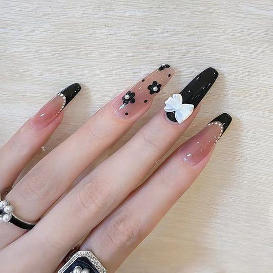 Floral Elegance Long Coffin Press On Nail Set in Black and Clear with Pearl and Bow Accents