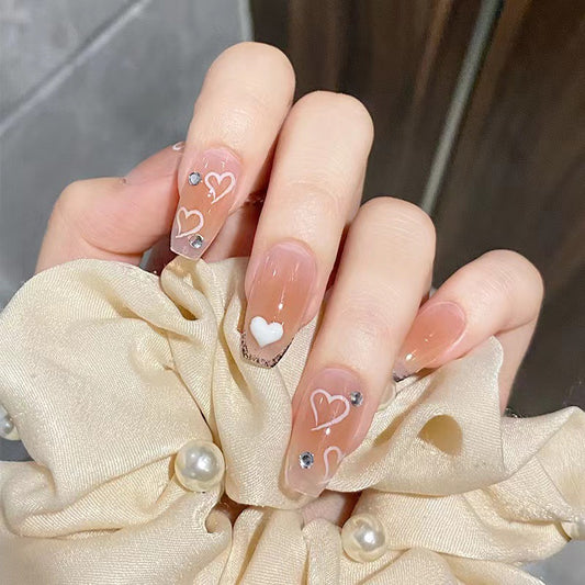 Romantic Heart Theme Long Coffin Peach Press On Nail Set with Charming Heart Designs and Sparkling Accents