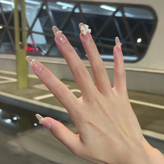 Glamorous Princess Inspired Long Coffin Beige Press On Nail Set with 3D Flower Accent and Rhinestone Detail