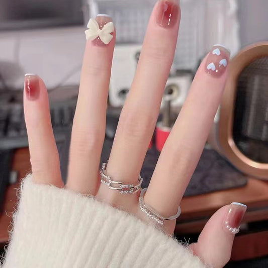 Charming Enchantment Short Square Beige Press On Nail Set with Bow and Heart Designs