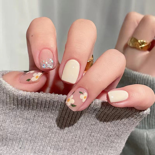 Floral Dream Press On Nail Set Short Square Creamy Beige Glitter and Flower Detail Design for Effortless Elegance