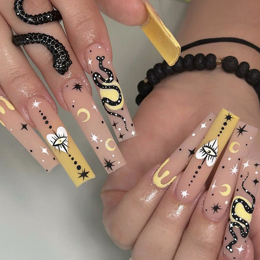 Cosmic Serpent Press On Nail Set Long Square Yellow and Beige with Celestial and Snake Designs