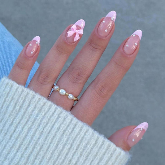 Elegant Ballet-Inspired Long Almond Baby Pink Press On Nail Set with Charming Bow and Gem Accents