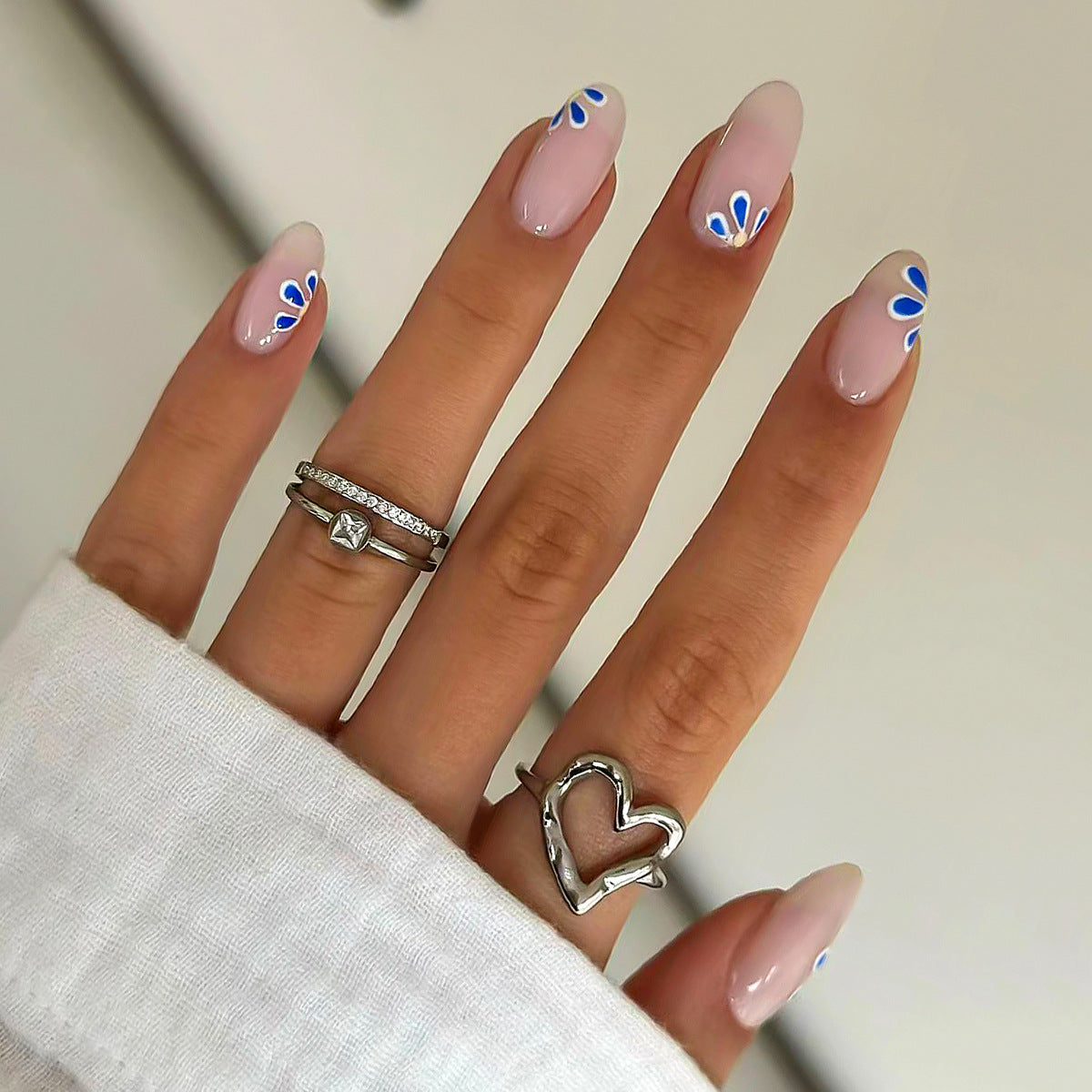 Charming Floral Elegance Medium Oval Pink Nails with Blue Flower Accents