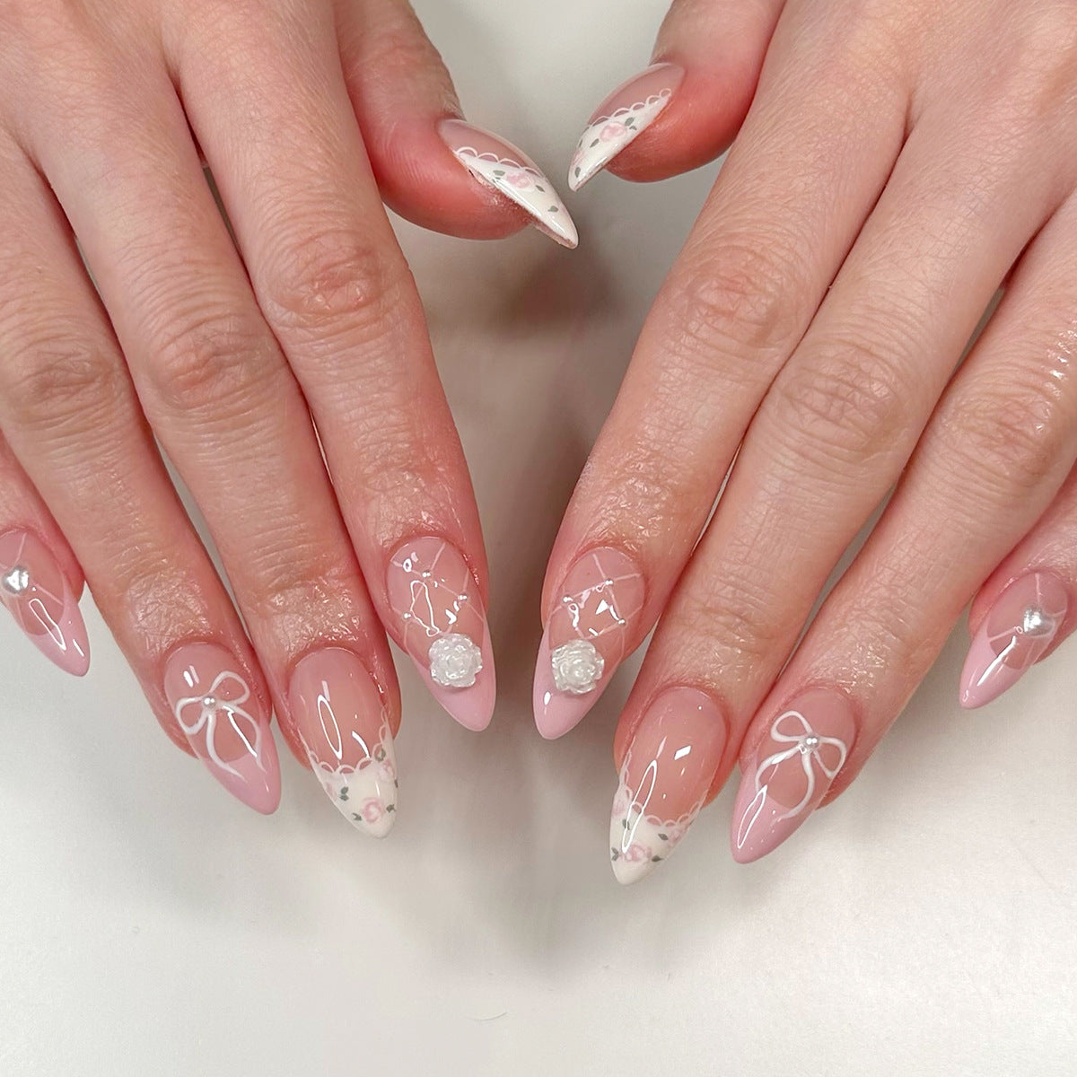 Whimsical Elegance Medium Almond Pink Nails with Floral Accents