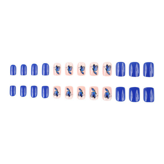 Whimsical Butterfly Garden Medium Squoval Blue Press On Nail Set with Intricate Floral Designs