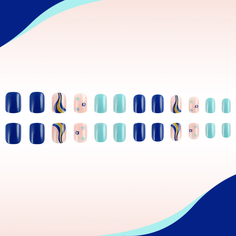 Ocean Breeze Short Square Press On Nail Set in Deep Blue Subtle Mint with Elegant Wave Designs and Glitter Accents