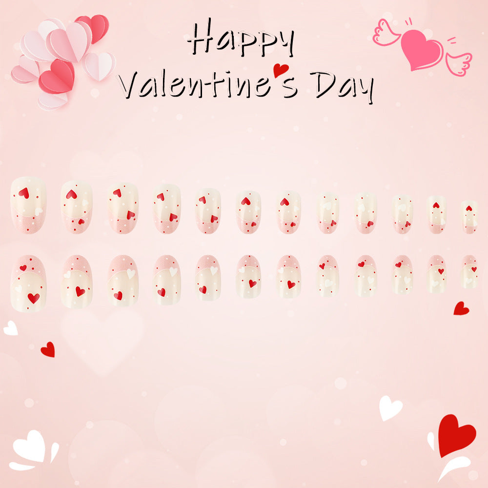 Valentine’s Day Delight Medium Oval Soft Pink Press on Nail Set with Heart Patterns