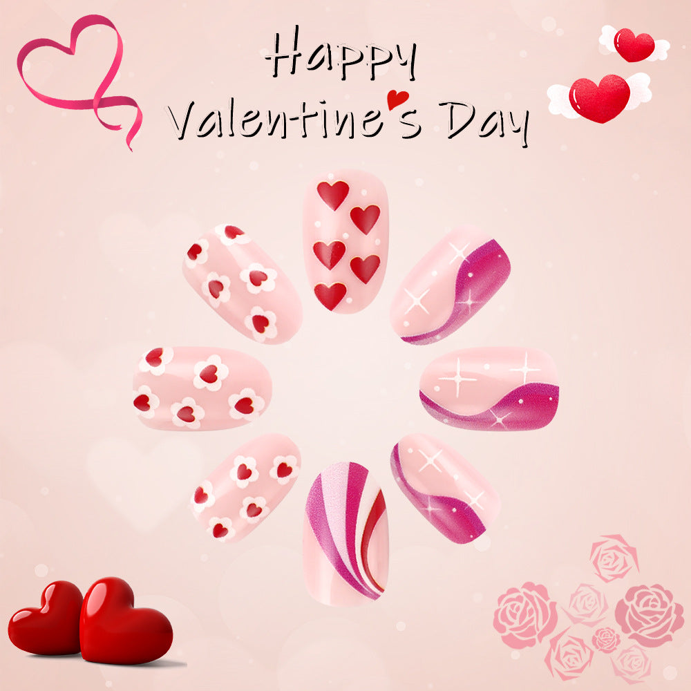 Enchanting Romance Short Oval Soft Pink Adorned with Heart and Floral Patterns Nail Set