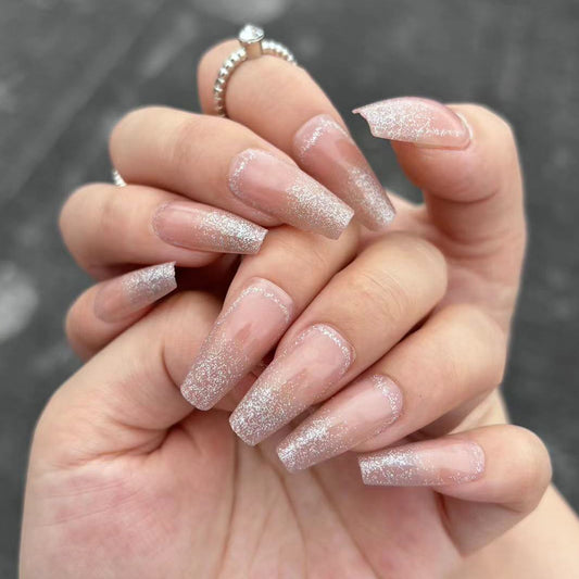 Shimmering Elegance Long Coffin Beige Nails with Iridescent Glitter Finish