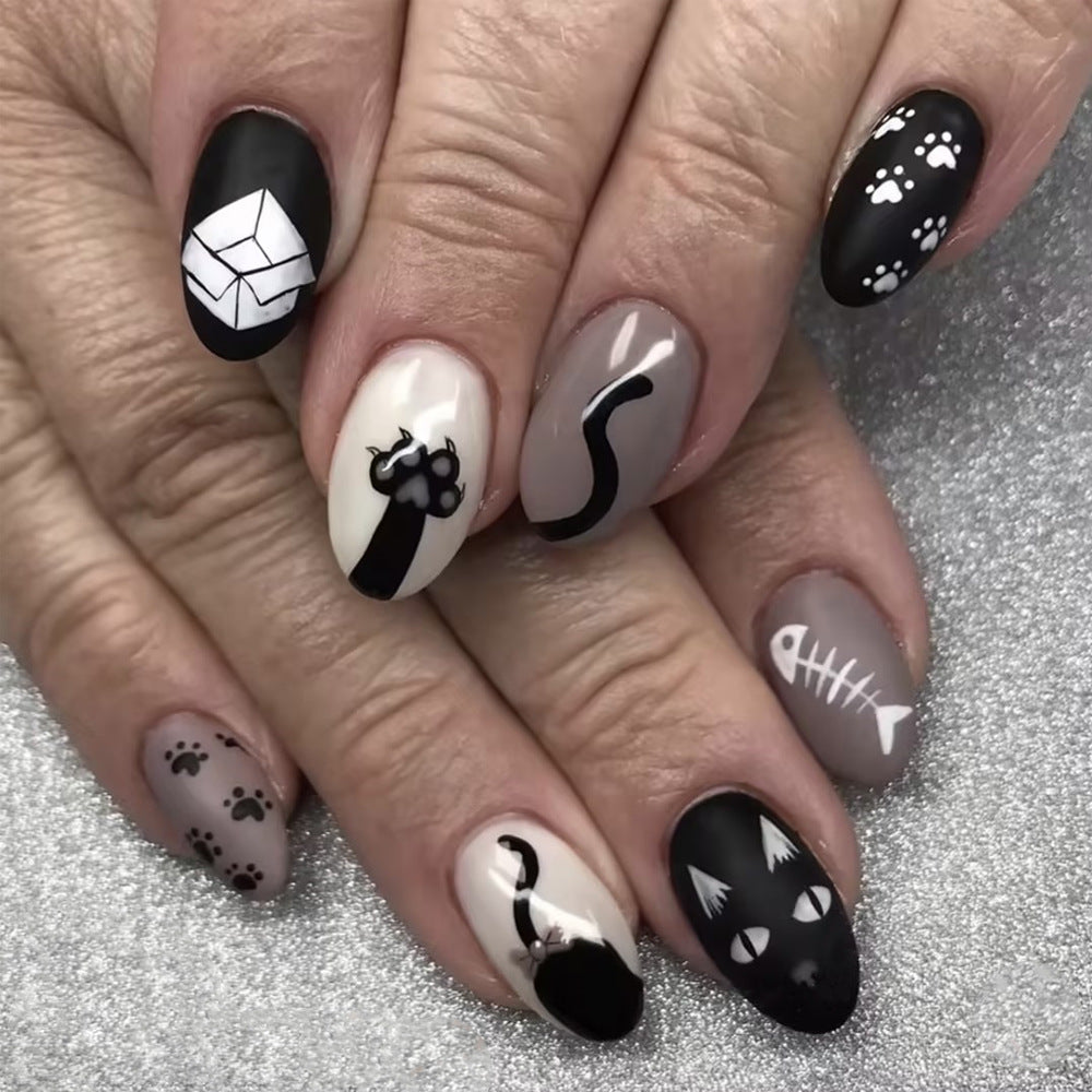 Purrfectly Chic Medium Almond Black and Grey Cat-Themed Press On Nail Set with Cute Paw Prints and Whimsical Designs