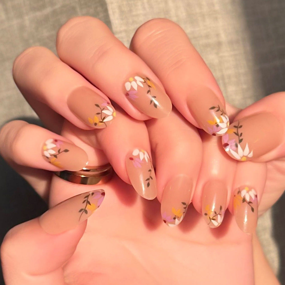 Floral Elegance Medium Oval Beige Press On Nail Set with Delicate Blossom Design