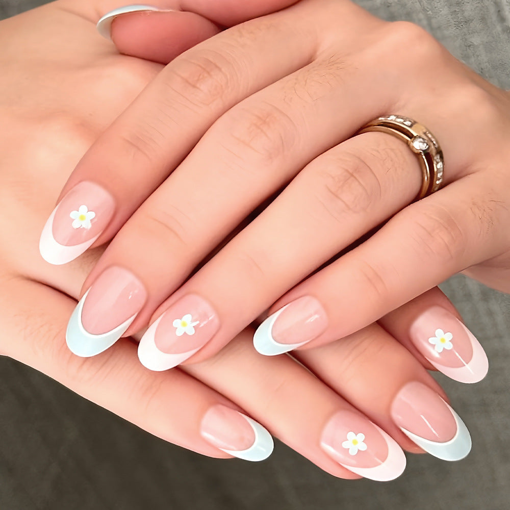 Whimsical Spring Blossom Medium Oval Shaped Sky Blue and White Press-On Nail Set with Floral Accent