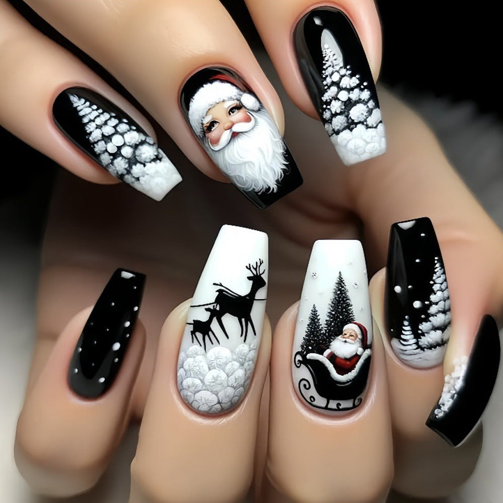 Festive Elegance Long Coffin Black and White Winter Wonderland Nail Set with Intricate Santa and Reindeer Designs