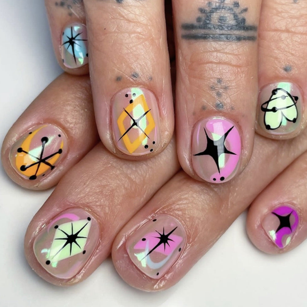 Cosmic Fun Short Oval Multicolor Press On Nail Set with Retro Starburst Design