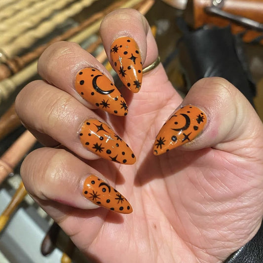 Celestial Vibes Long Stiletto Orange Press On Nail Set with Star and Moon Accents