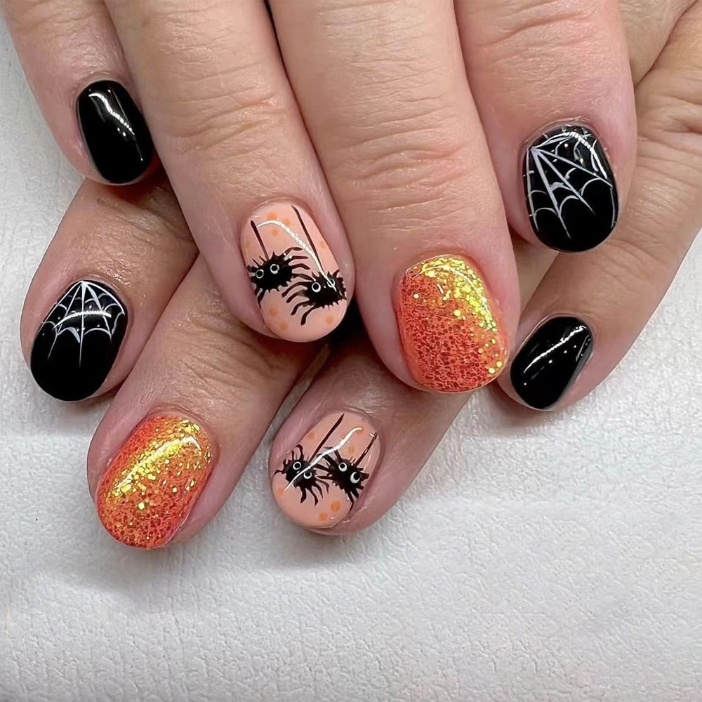 Halloween Spooktacular Short Oval Black Orange and Peach Glitter Press On Nail Set with Spider and Web Designs