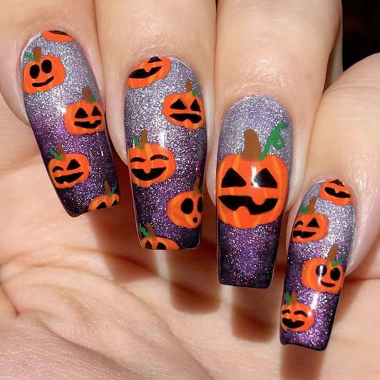 Spooky Pumpkin themed Long Coffin Shape Purple and Glitter Press On Nail Set with Halloween Jack-o'-Lantern Design