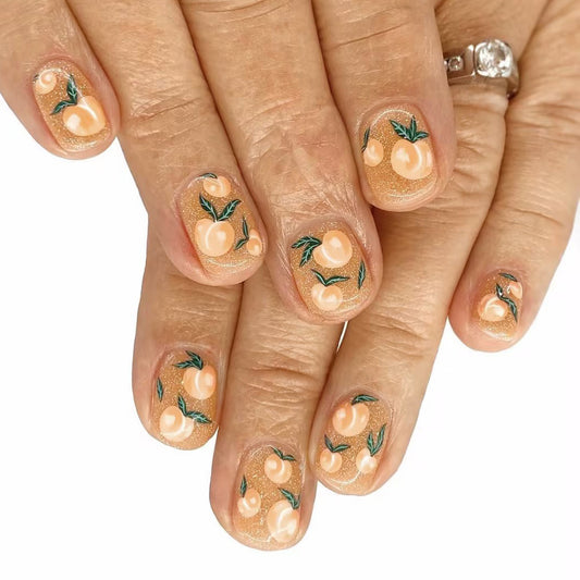 Citrus Blossom Short Oval Peach and Green Press On Nail Set with Glittering Finish